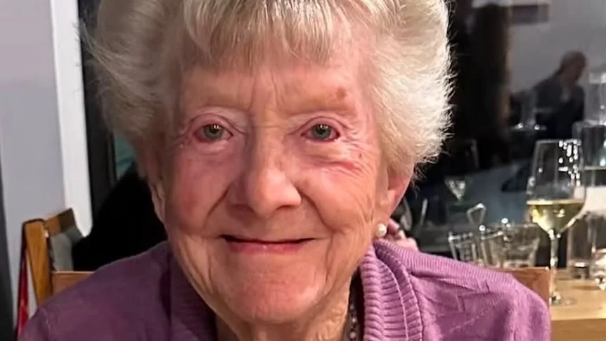An elderly woman.