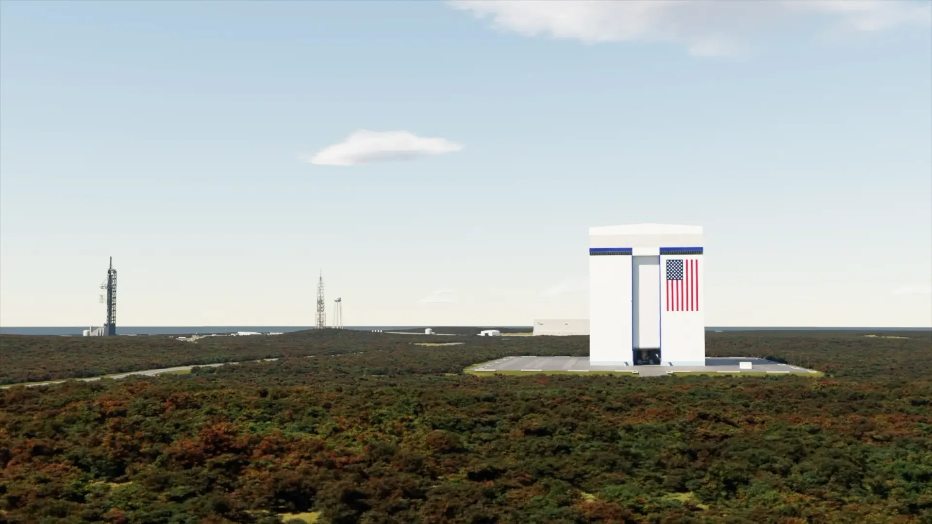 A square building stands on a flat landscape with a pair of rocket launch towers in the background.