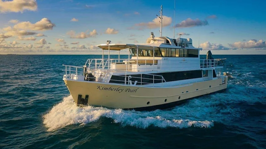 A large boat sails on the water.