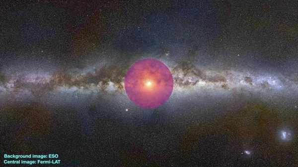 A pink circle in the center of a scene showing the Milky Way's heart.