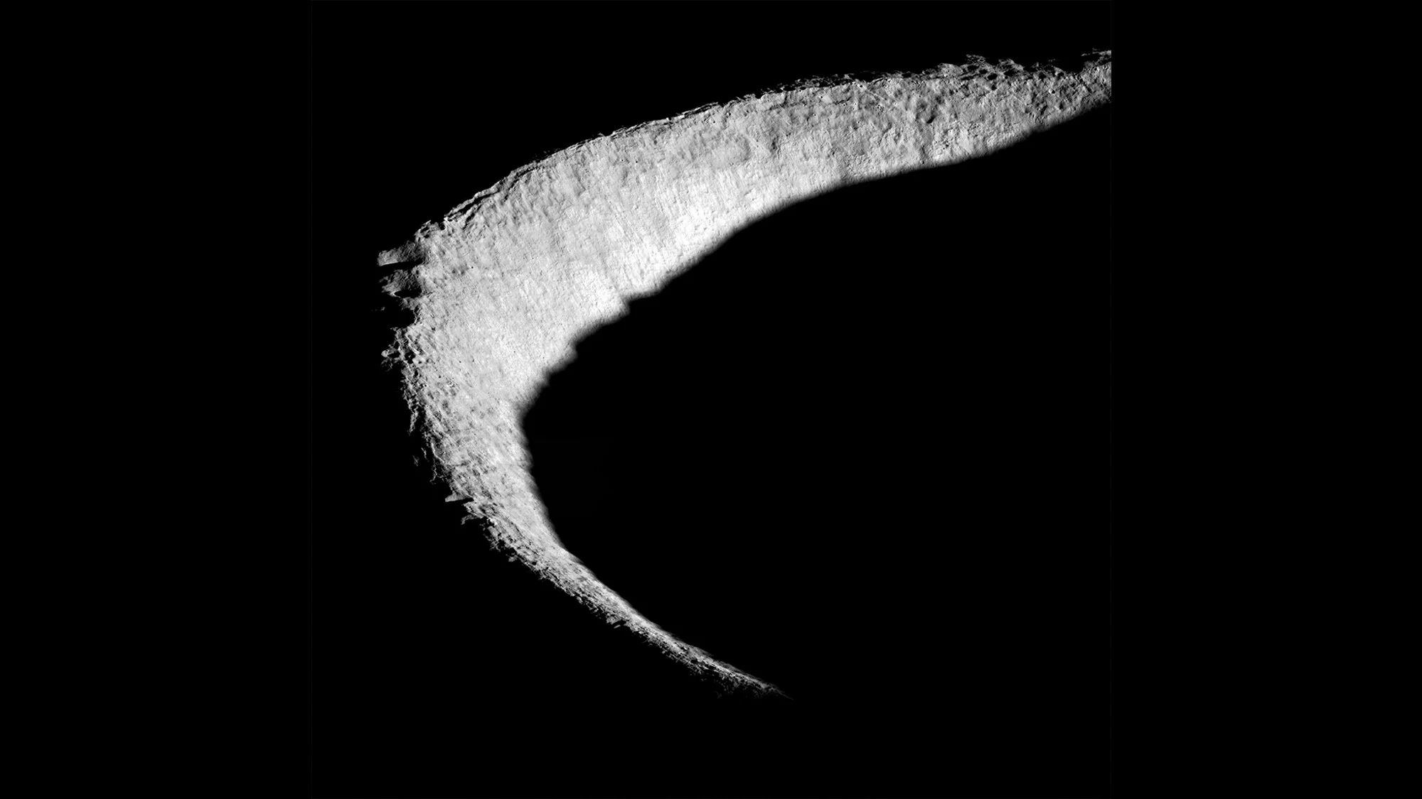 a crescent-shaped rim of a crater