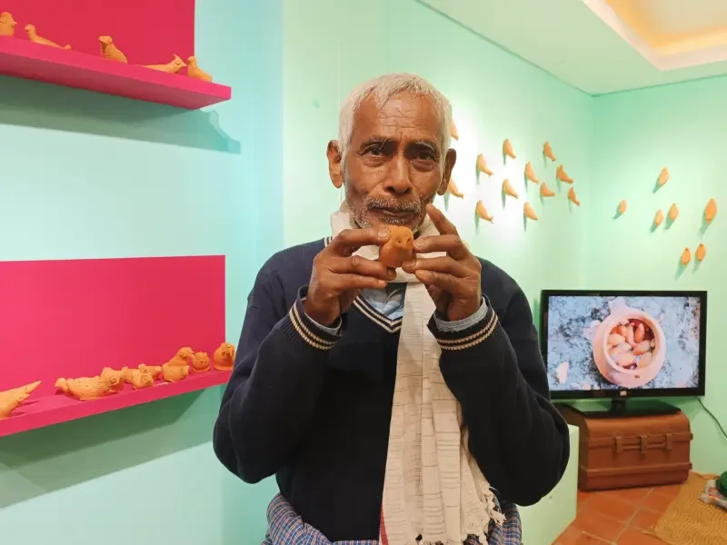 a man playing pilru