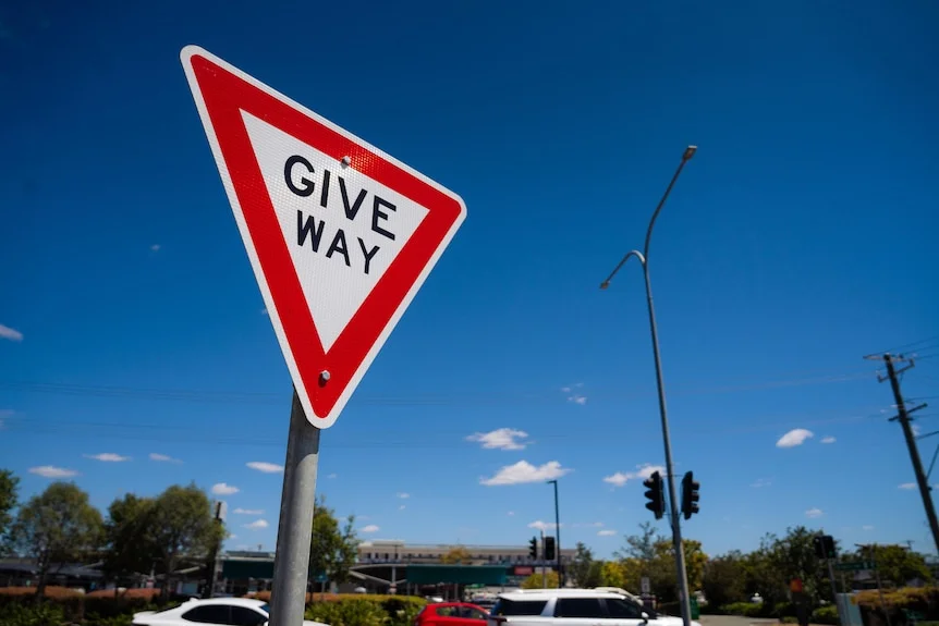 a give way sign on a sunny day in brisbane