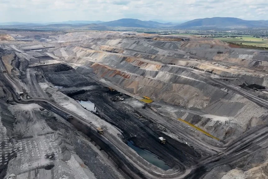 a drone view of an open cut coal mine