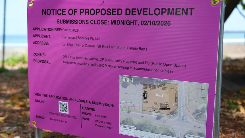 A pink sign stands at 39 East Point Road, Fannie Bay and reads: NOTICE OF PROPOSED DEVELOPMENT