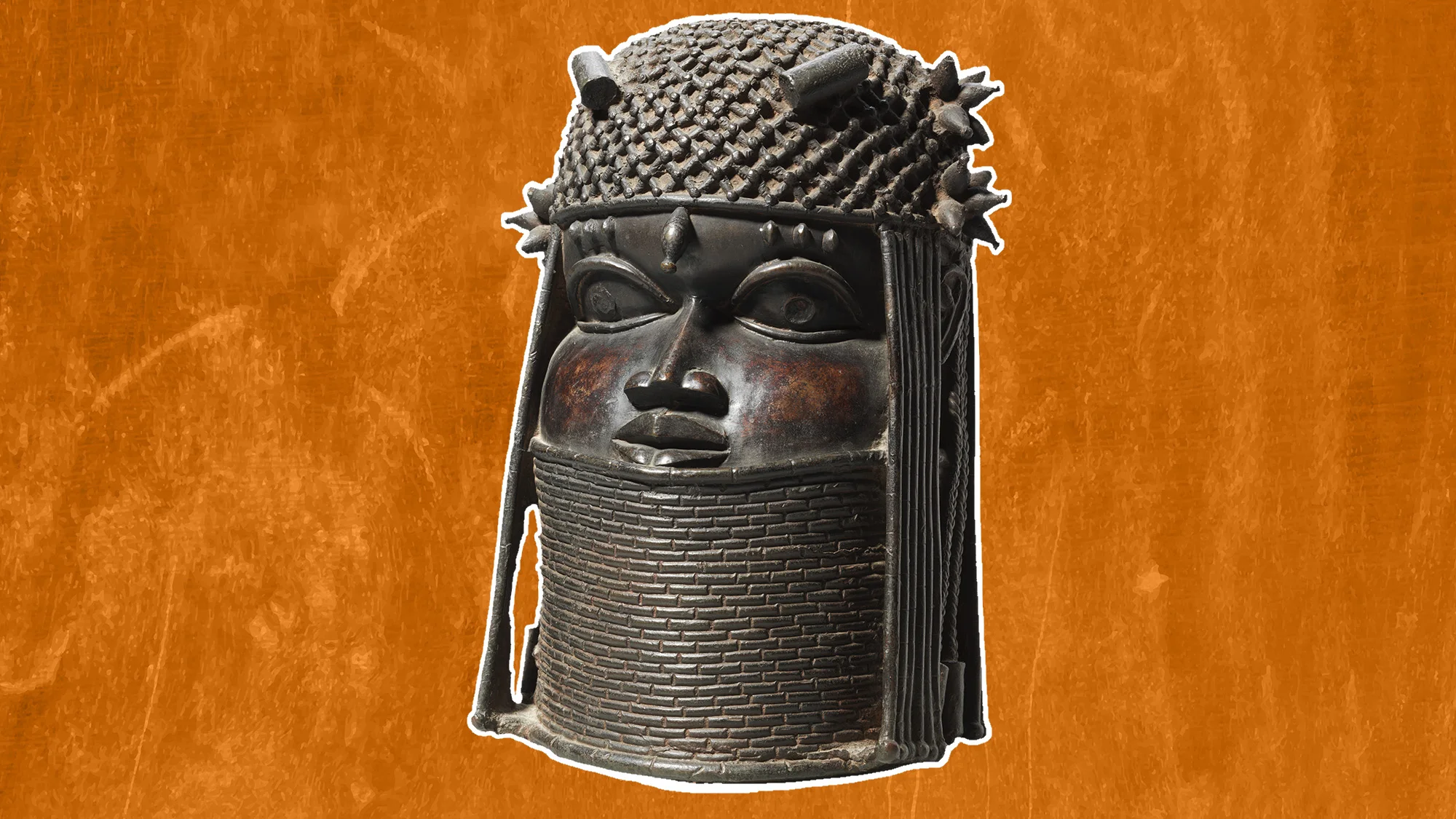 This brass head depicts an 