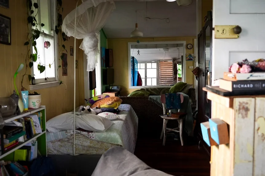 The inside of a home showing large openings where breezes can pass.