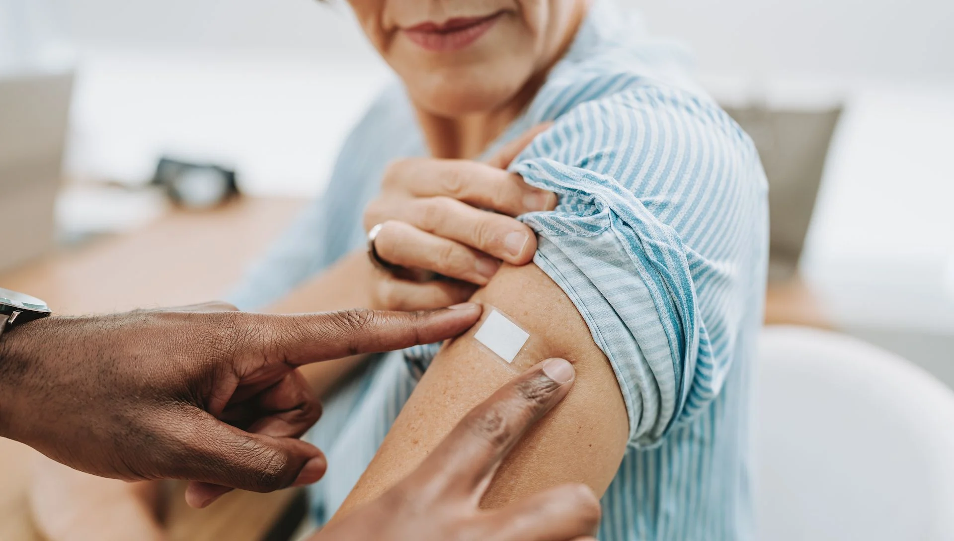 a woman receives a vaccine